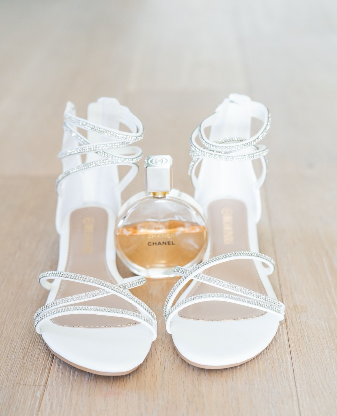 All the months of planning come down to these final, delicate touches. There’s something so intentional about the shoes or perfume a bride chooses for her wedding day. It’s more than an accessory; it’s a piece of her story. ✨⁠