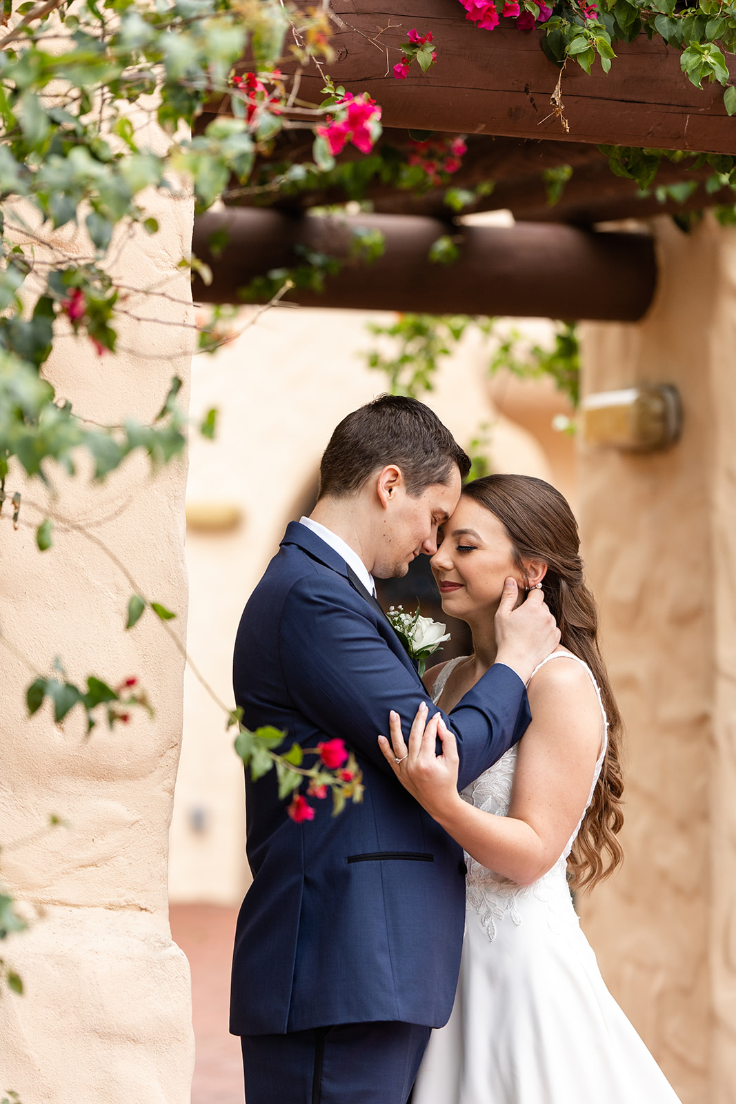 Couple under greenery